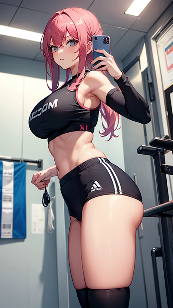 A girl in gym outfit taking a selfie big boobs showing