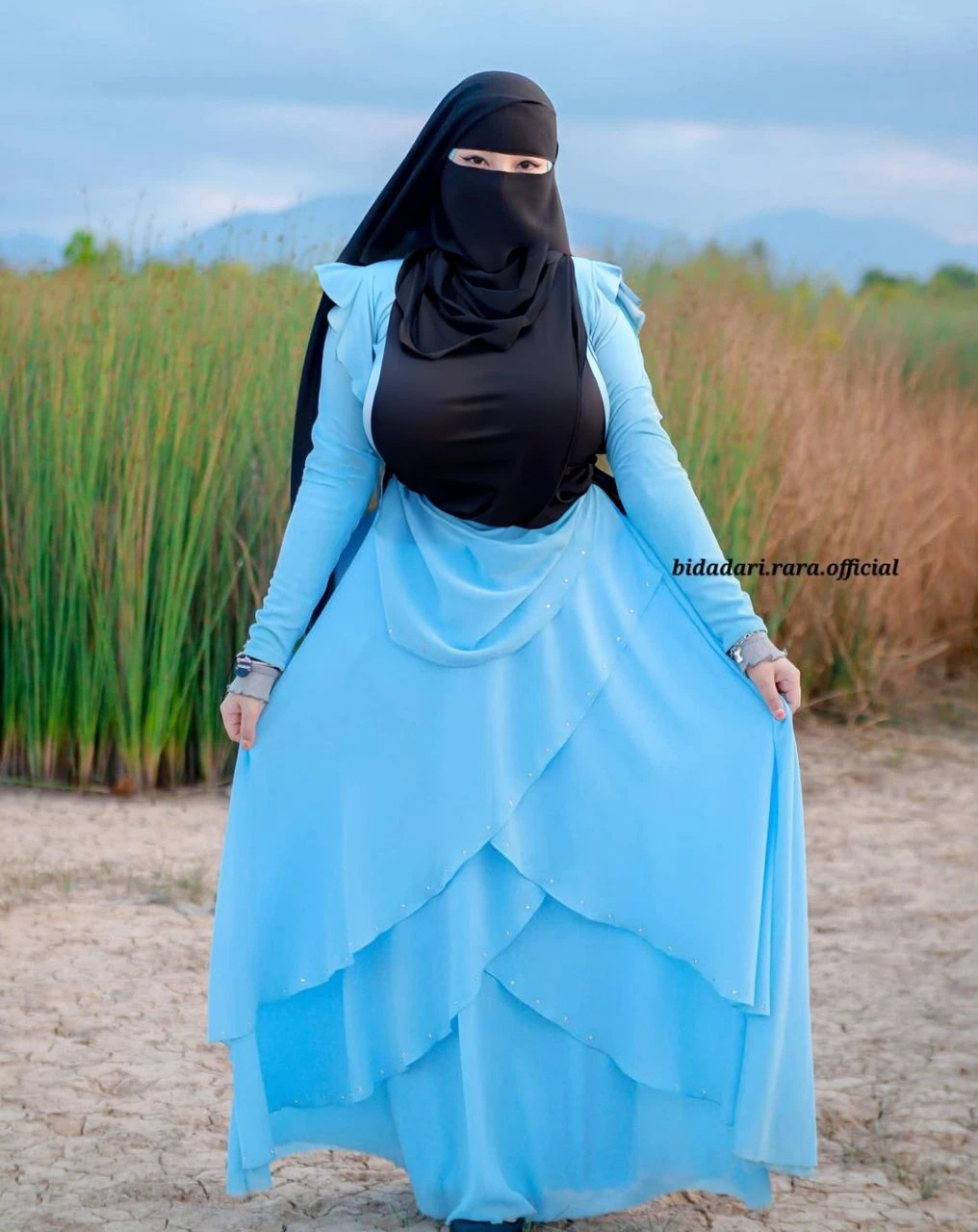 High resolution UHD, Improvement of quality, Soft lighting, Highly detailed, Very detailed on clothes, high quality clothes, Advanced Details, Sharp Focus, High resolution, Big Boobies, Big Breasts, Breasts Covered With Hijab and Dress, Real clothes, Real Lighting, Same clothes, Same dress With Big Breasts, Big Boob Undershirt covered