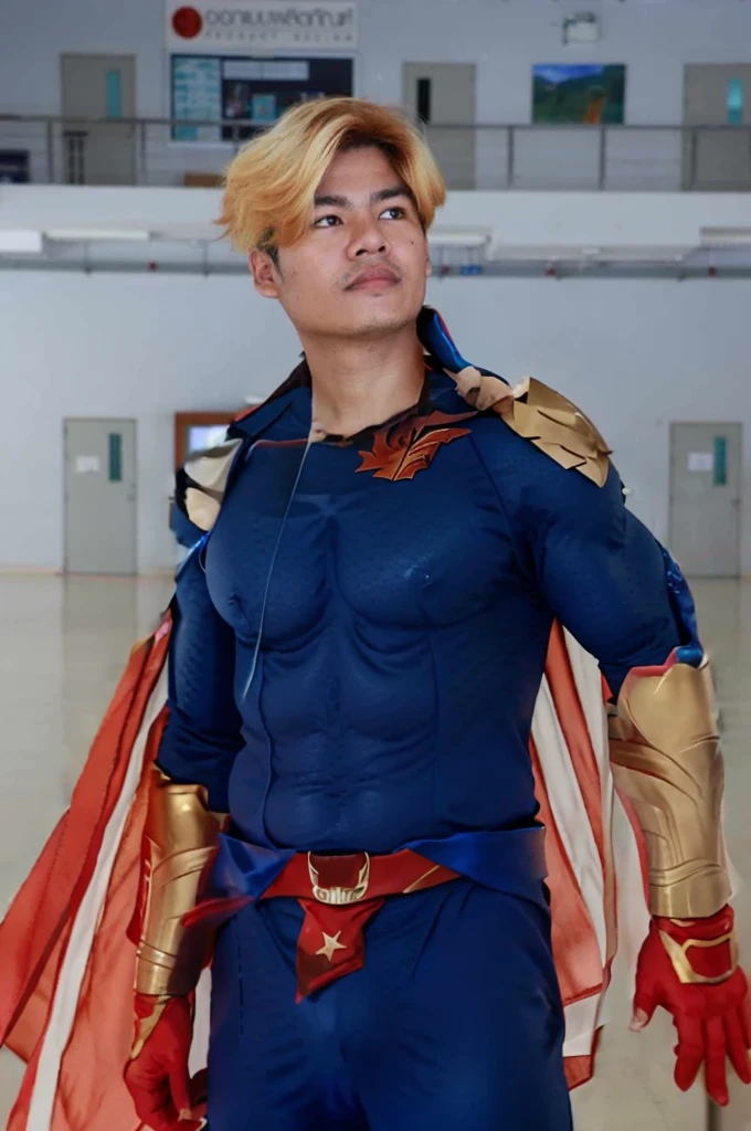 Homelander's costume heavily features American patriotic symbols, such as the stars and stripes, which underline his public persona as a hero embodying American values.
Color Scheme: The red, white, and blue color scheme is prominent, enhancing his image as the quintessential American superhero.
Armor-like Elements: His suit is designed to look almost like armor, suggesting strength and invulnerability, reflecting his superhuman abilities.
Cape and Eagle Motif: He sports a cape, often associated with traditional superheroes, and an eagle emblem on his shoulder, further reinforcing the American theme.
