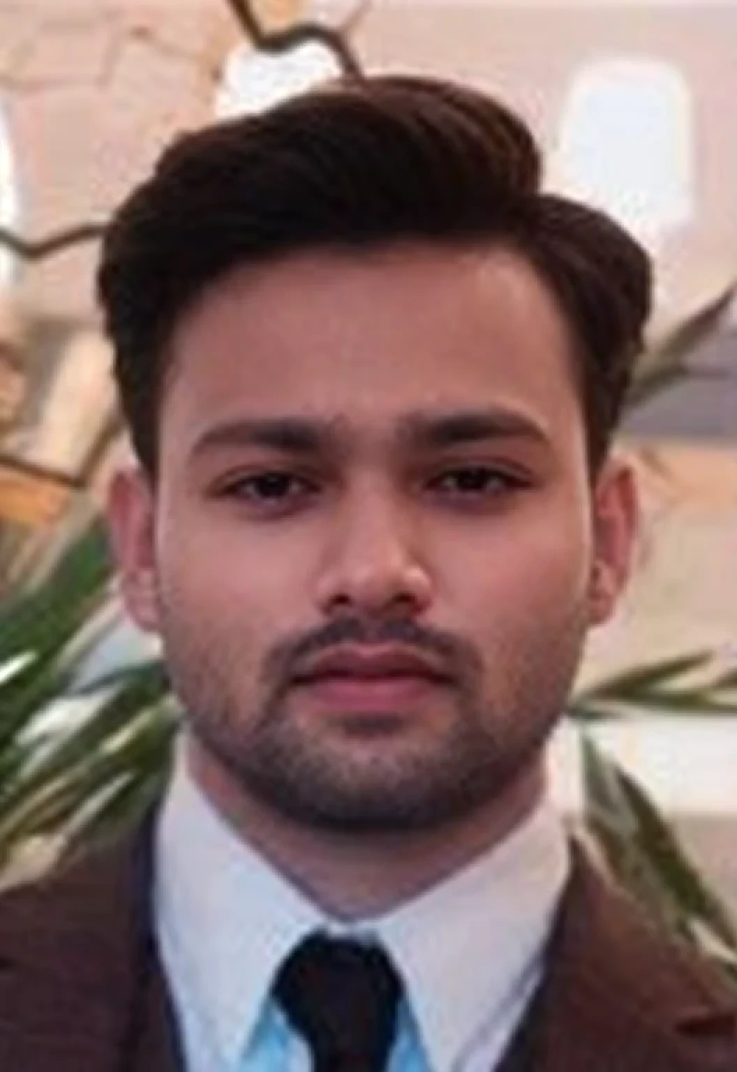 A beautiful young bearded man with highly detailed skin.