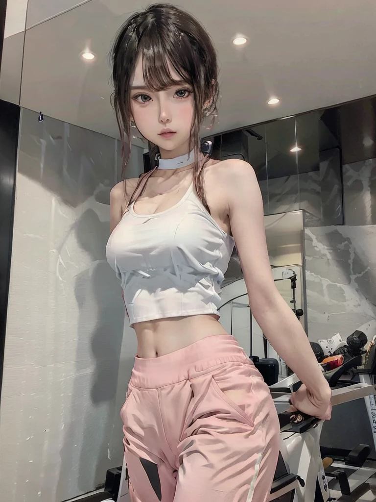 The image shows a young woman wearing a white crop top and pink pants, standing in a gym with a weight machine in the background.