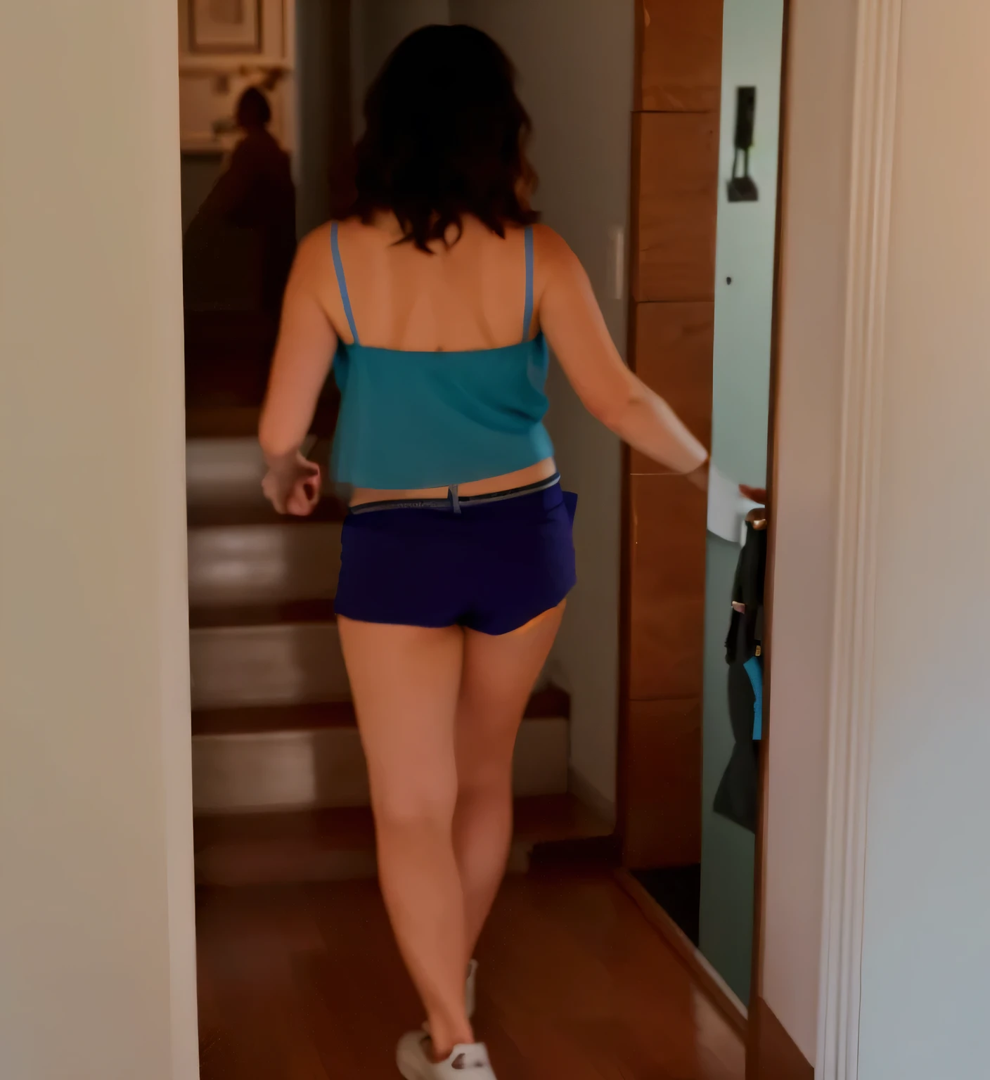 there is a woman walking down a hallway with a blue skirt, side view of her taking steps, coming down the stairs, walking away from camera, in shorts, seen from the back, walking away from the camera, view from the back, wearing a camisole and shorts, uhd candid photo of dirty, photographed from the back, photo still of posterior view