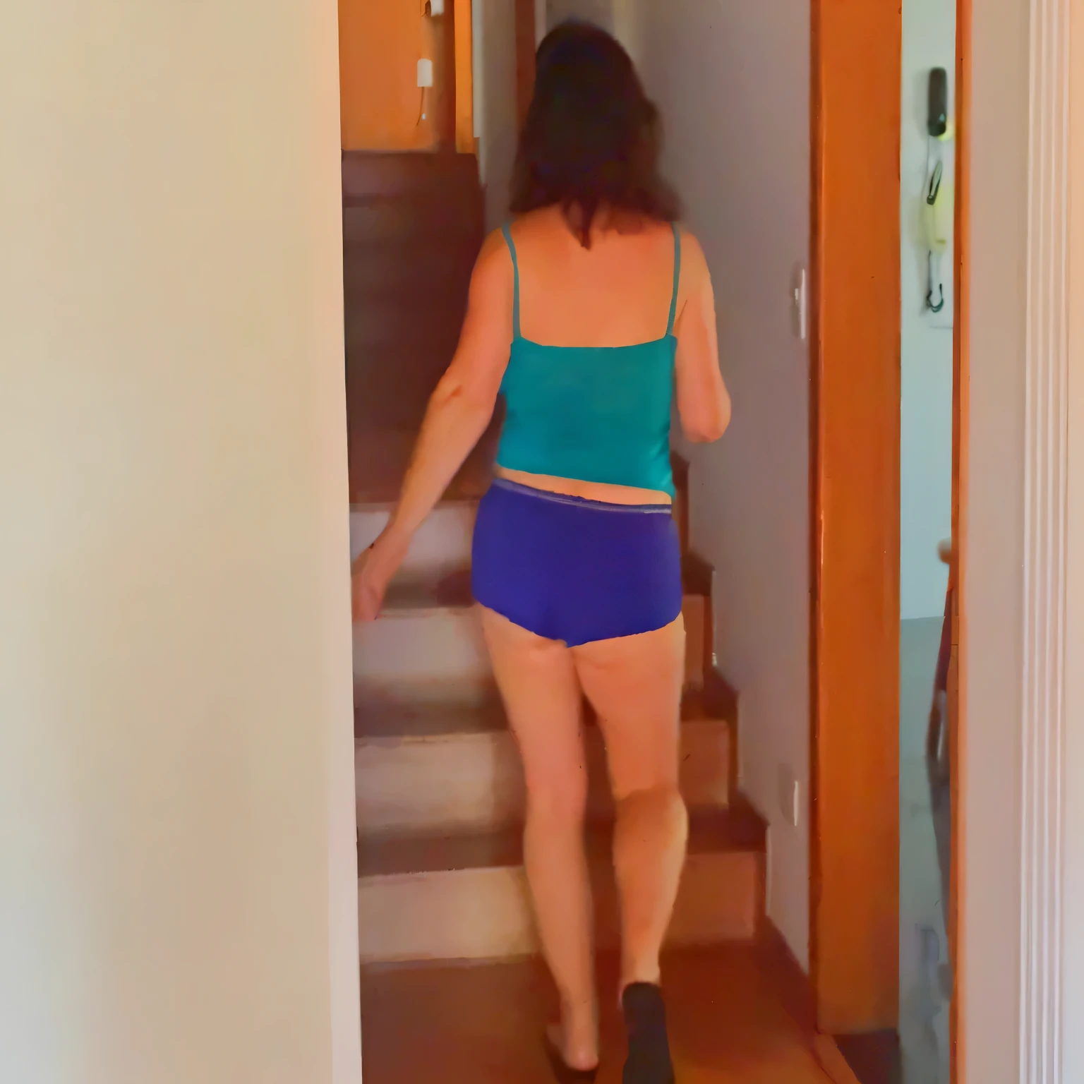 there is a woman walking up the stairs in a blue top, coming down the stairs, side view of her taking steps, in shorts, uhd candid photo of dirty, walking away from the camera, walking away from camera, booty shorts, gif, exposed thighs!!!, wearing a camisole and shorts, sneaking, view from the back, stairs