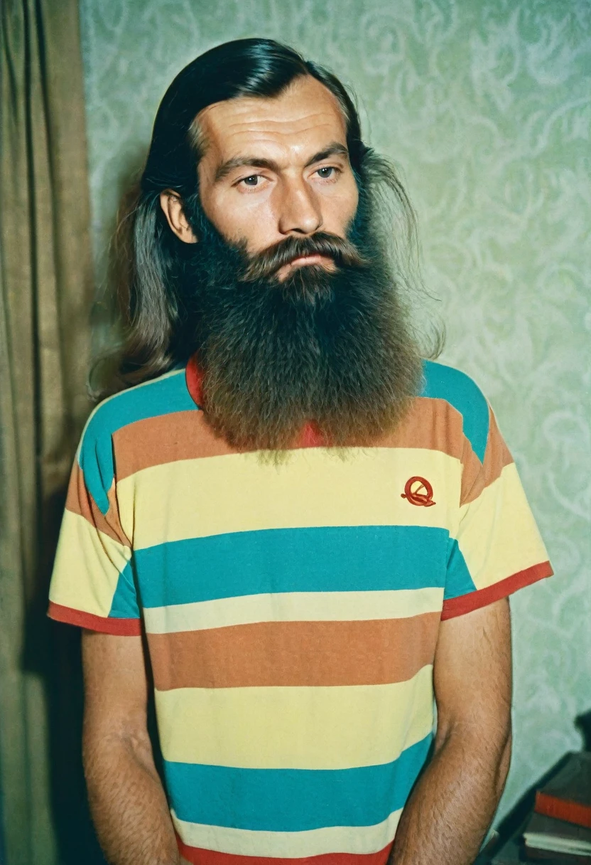 color photo, kind man, portrait photo, in 1980 style, USSR, photo taken in the apartment. The man has good facial features and a long beard., long hair, wearing a colorful T-shirt