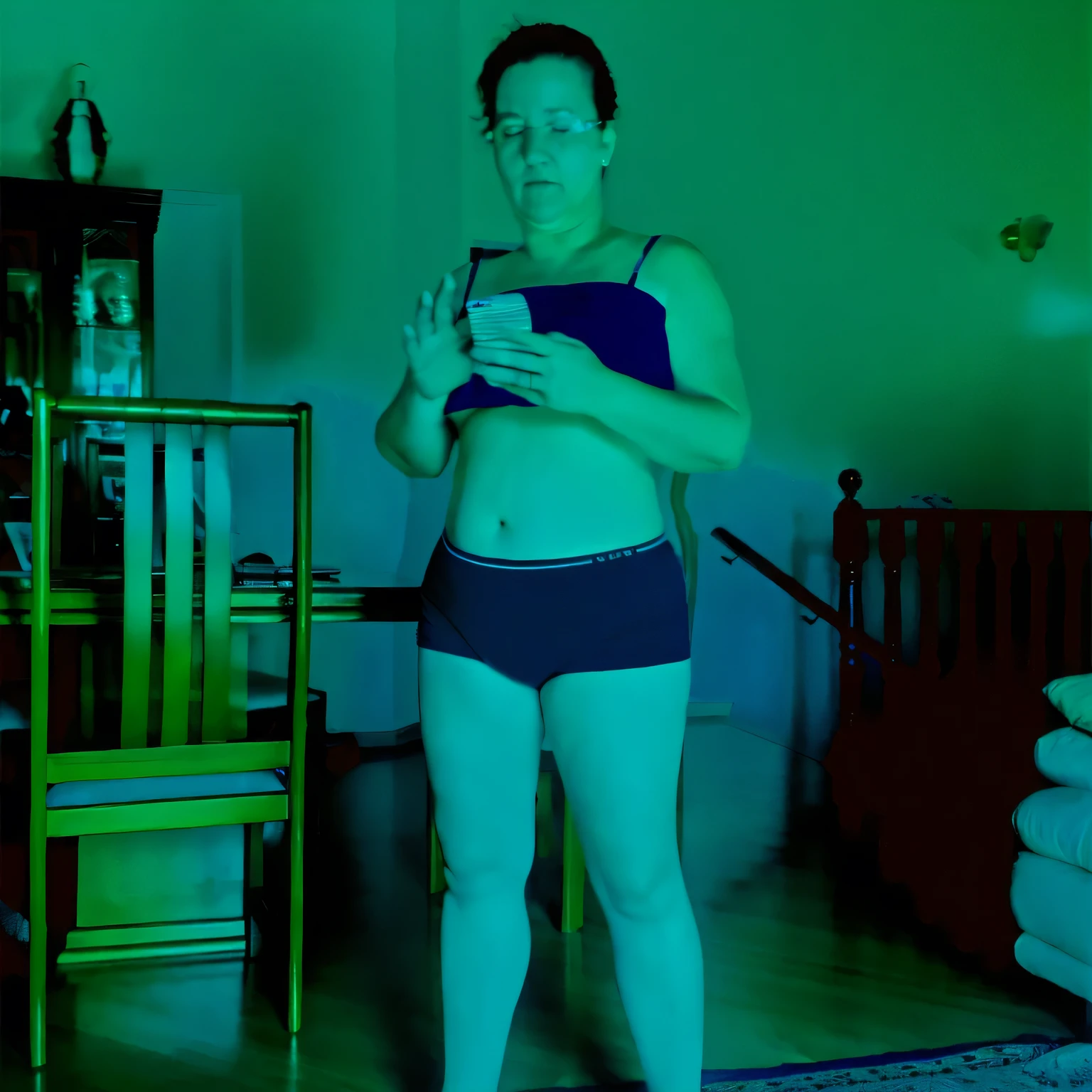 there is a woman in a blue bikini standing in a room, full body profile camera shot, full body in camera, unsettling photo, stable diffusion self portrait, full body photgraph, centered full-body shot, inspired by Nan Goldin, dark photo, obscured underexposed view, eerie self - portrait, distorted pose, photoscan