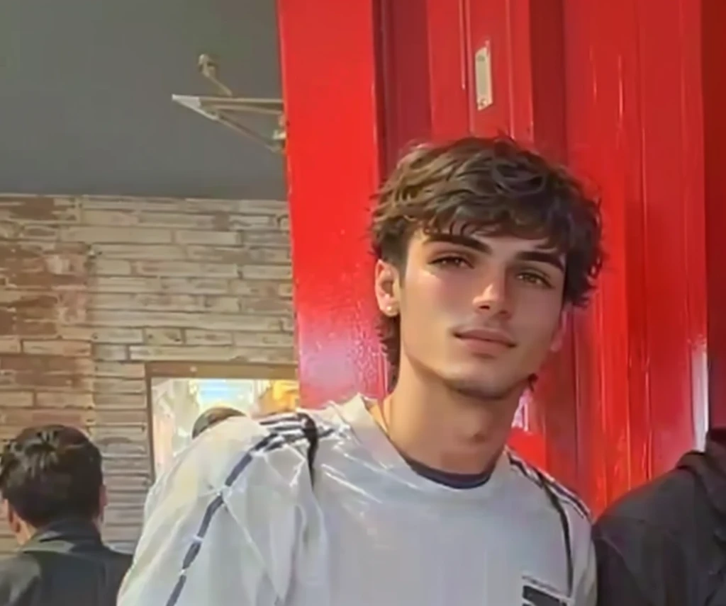 they are two men standing next to each other in front of a red wall, around 1 9 years old, enes dirig, mateus 9 5, very very low quality picture, taken in the early 2020s, aykut aydogdu, mohamed chahin, emad mostaque, by Nándor Katona, carmelo blandino