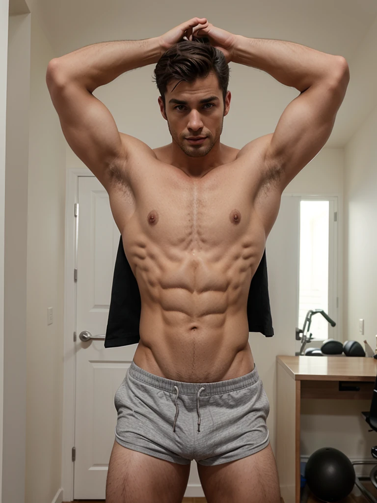 Handsome fitness guy with no clothes or pants was controlled