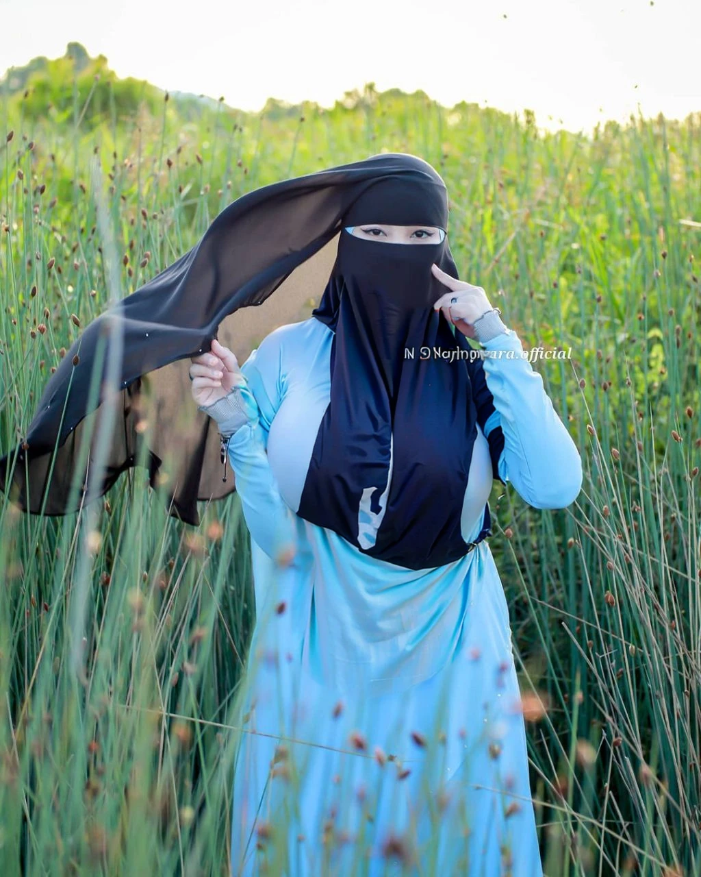 High resolution UHD, Improvement of quality, Soft lighting, Highly detailed, Very detailed on clothes, high quality clothes, Advanced Details, Sharp Focus, High resolution, Big Boobies, Big Breasts, Breasts Covered With Hijab and Dress, Real clothes, Real Lighting, Same clothes, Same dress With Big Breasts, Big Boob Undershirt covered