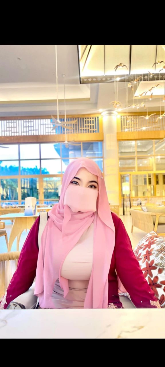 High resolution UHD, Improvement of quality, Soft lighting, Highly detailed, Very detailed on clothes, high quality clothes, Advanced Details, Sharp Focus, High resolution, Big Boobies, Big Breasts, Breasts Covered With Hijab and Dress, Real clothes, Real Lighting, Same clothes, Same dress With Big Breasts, Big Boob Undershirt covered