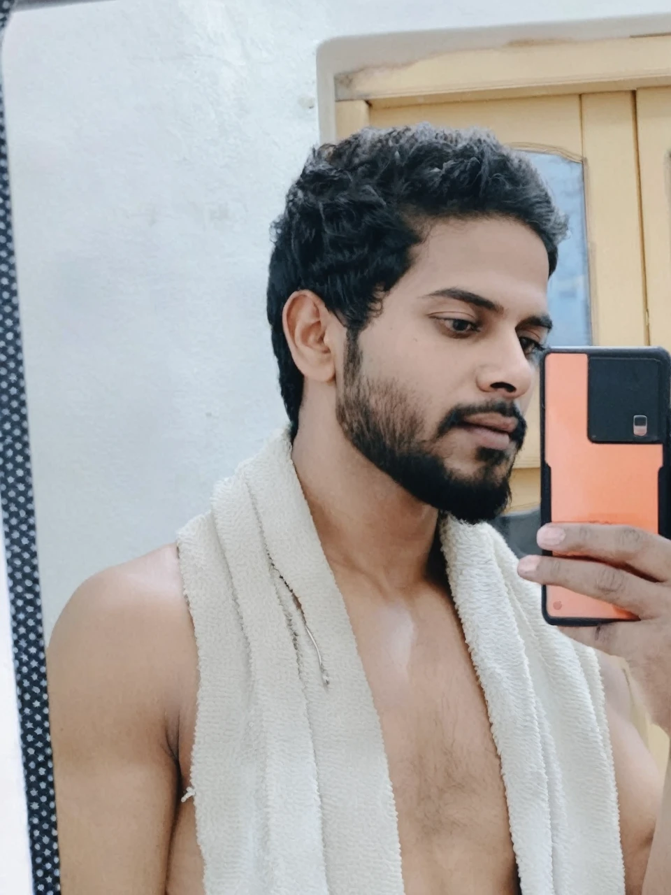 varun dhawan a man realistic photo in a worn ((skin-revealing skimpy erotic red tracksuit, massive hairy pecs)), abs, big pecs, big arms, bulge, VPL, ((light bokeh)), intricate, (steel metal [rust]), elegant, erotic, exuding sexual energy, homoerotic, sharp focus, photo by greg rutkowski, soft lighting, vibrant colors, (masterpiece), ((streets)), (detailed face), looking at viewer, light smile, night, walking towards viewer, cinematic lighting, beautiful lighting, cinematic lighting, (hazy filter, film grain:1.2)