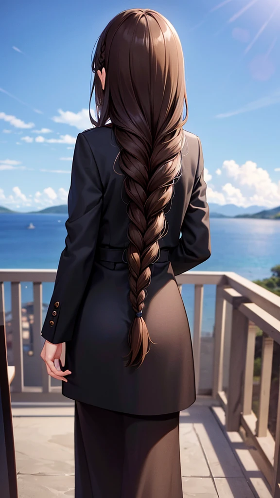 Brown haired woman next to twisted braids Standing in an all black suit, standing with your back looking at the beautiful view of the sky.