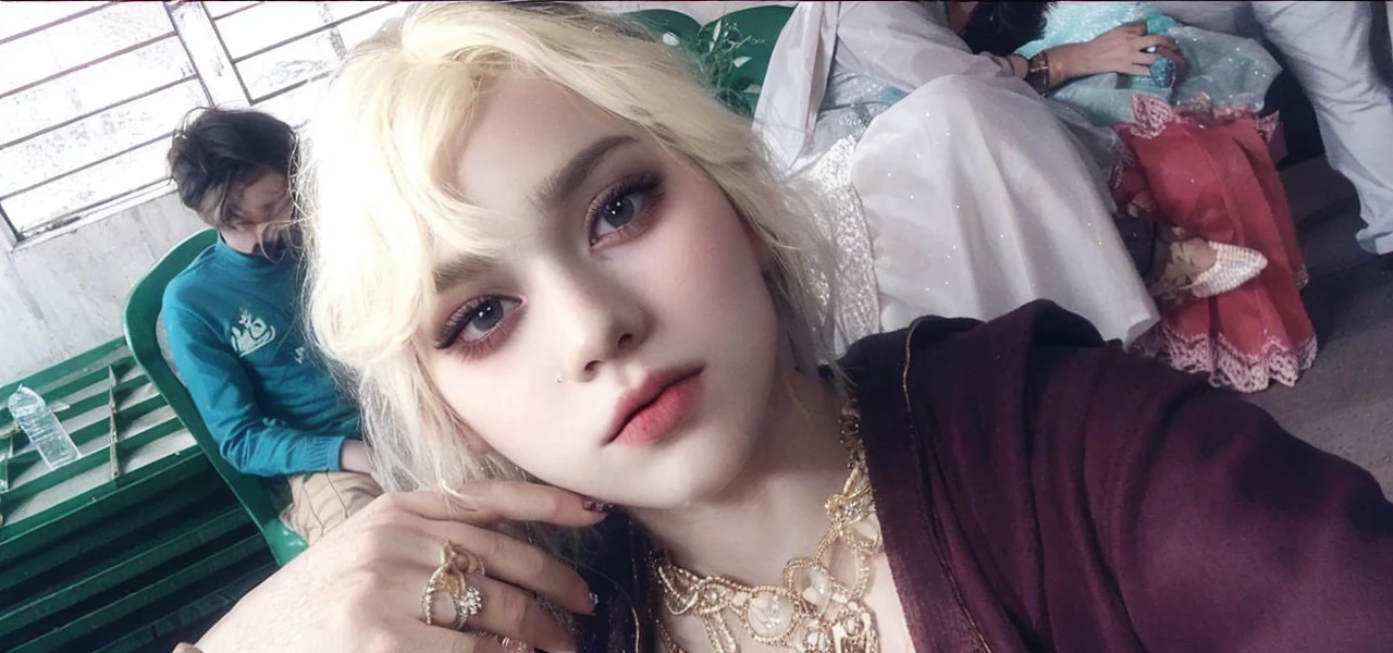 Girl, blonde hair, gray eyes, sharp features, white skin, pink lip, sweater