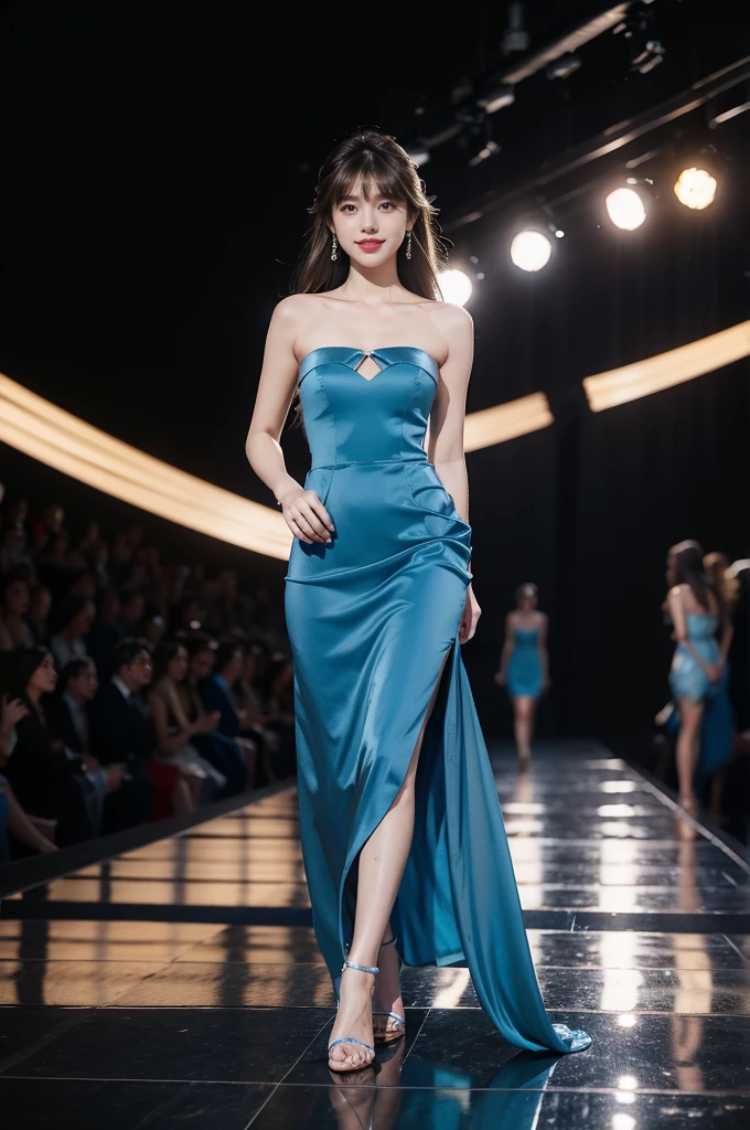 1girl,bangs,bare shoulders,barefeet,strapless blue dress,detailed background,brown eyes,brown hair,cleavage,blue dress,earrings,full body,jewelry,flat chest,long hair,looking at viewer,makeup,night scene,red lips,signature,smile,solo,standing,thighs,slender legs,high heels,On the T-stage,catwalk,fashion show,Surrounded by crowded crowds on both sides of the stage