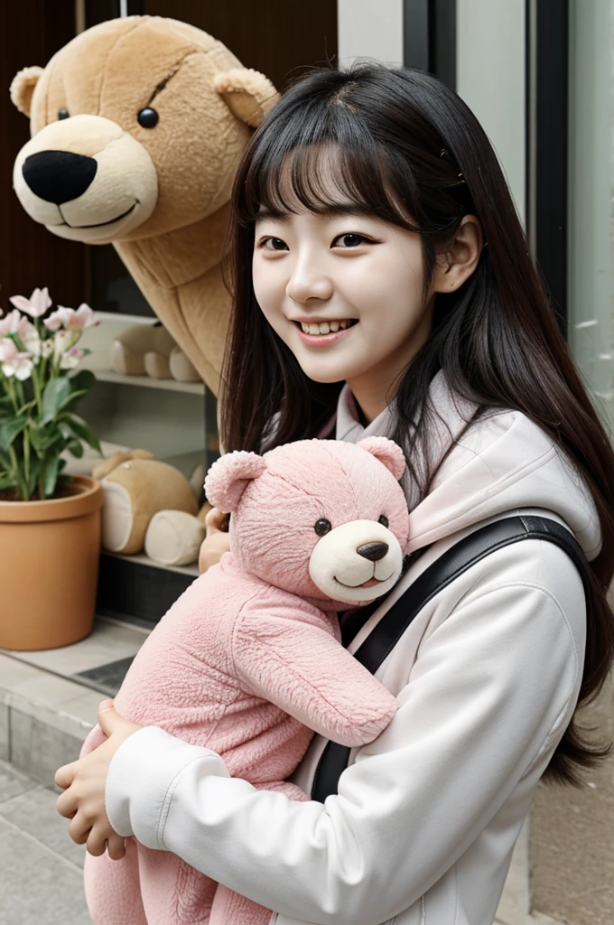 Haneul is a  of 3 years old, she is Korean and she is happy and with her bear 