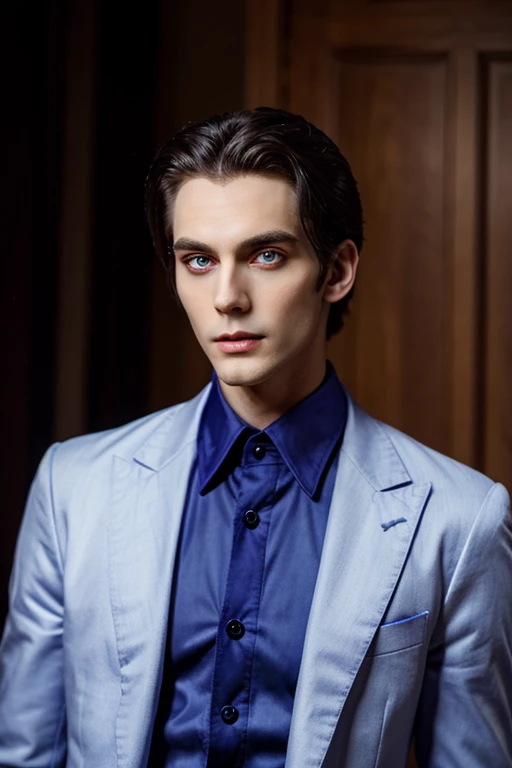 Young and tall lovely vampire man with big indigo eyes