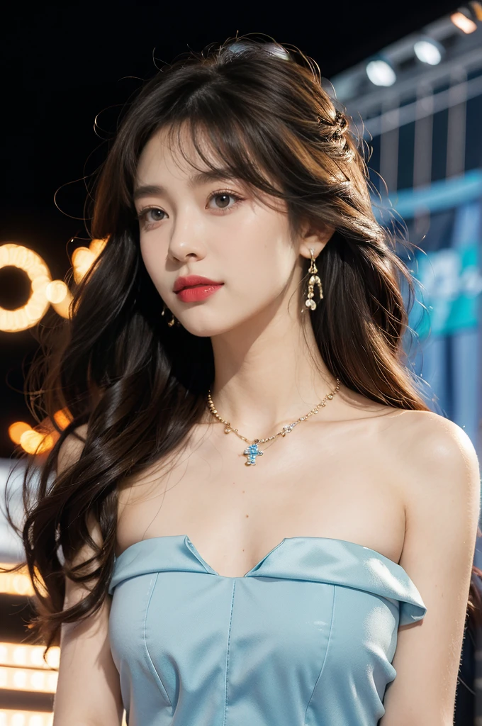 1girl,bangs,bare shoulders,necklace,strapless blue dress,detailed background,detailed eyes,brown hair,earrings,close-up of face,jewelry,slim,flat chest,messy hair,looking at viewer,makeup,night scene,red lips,signature,laughing,solo,standing,On the T-stage,catwalk,fashion show,Surrounded by crowded crowds on both sides of the stage,neon lights