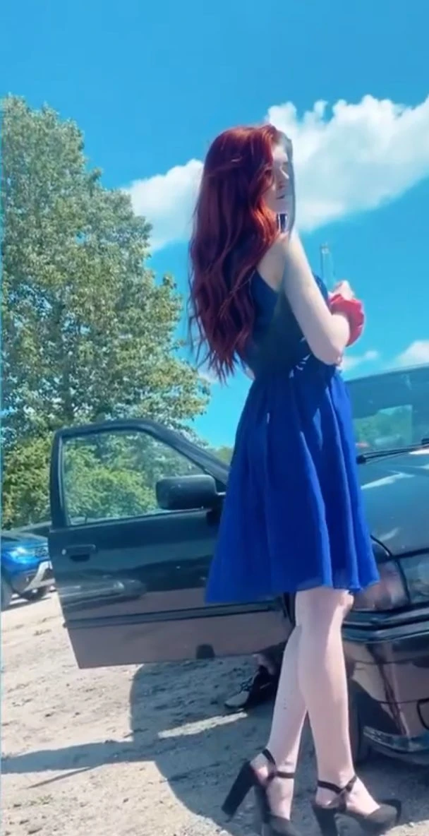 (((Masterpiece))), 25-year-old Caucasian French girl with shoulder-length messy red hair, adorned with  crystal glow, blooming hair akin to . Certainly!

