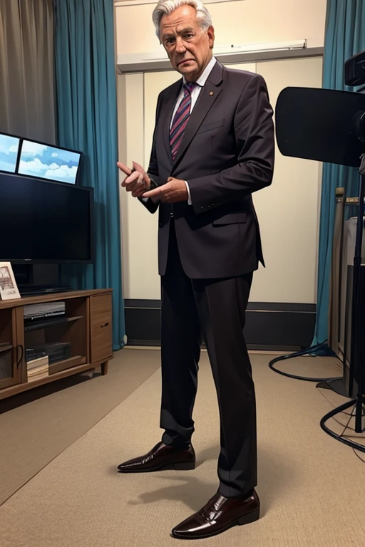 front view of 70 year old male TV news presenter wearing brown shoes