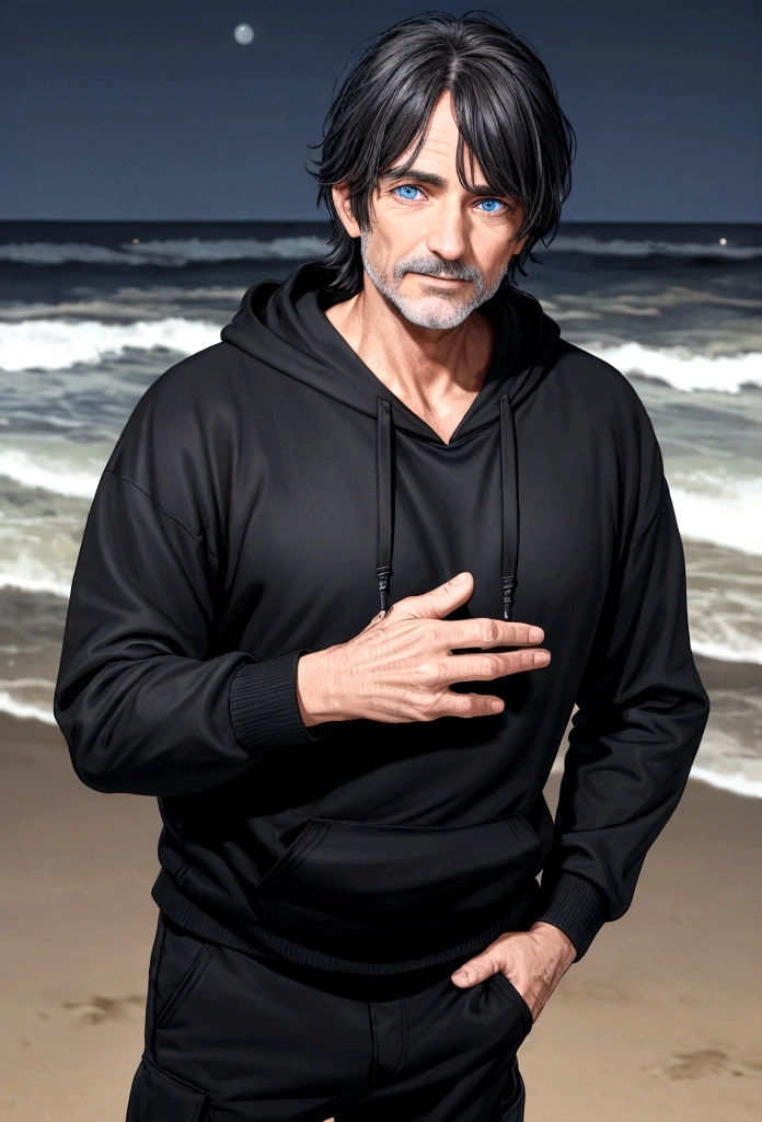 a 55 year old man with dark hair and blue eyes and a black hoodie and black cargo pants at night at the beach
