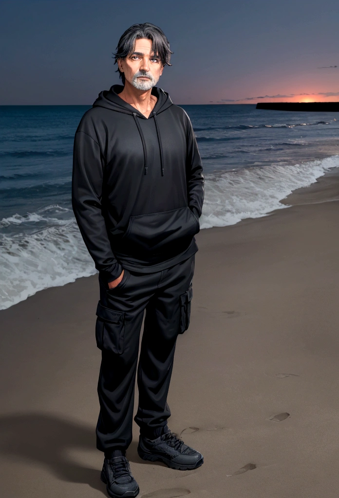 a 55 year old man with dark hair and blue eyes and a black hoodie and black cargo pants at night at the beach