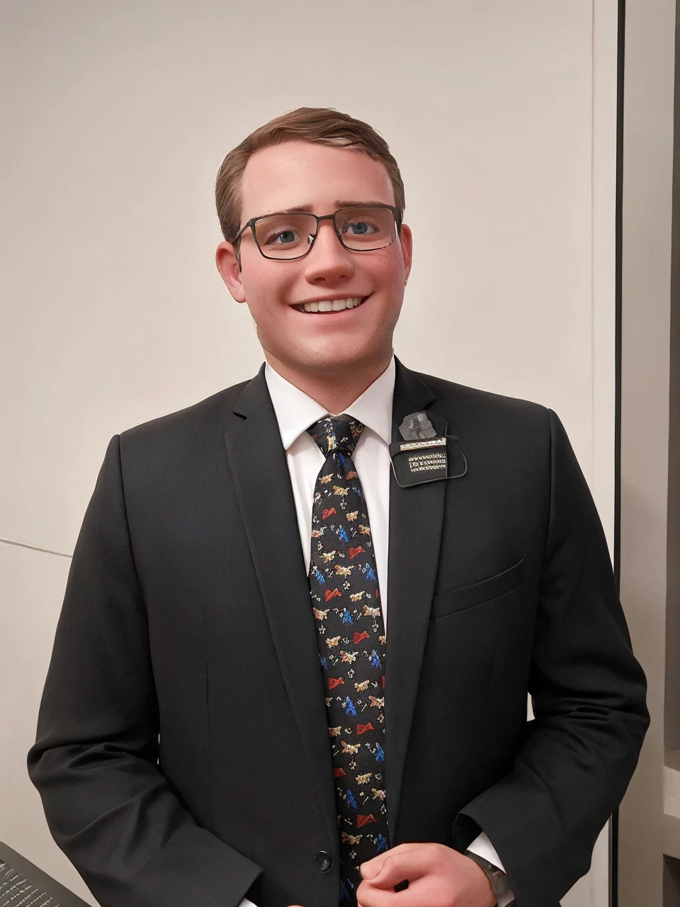 LDS Missionary with glasses, a suit and tie