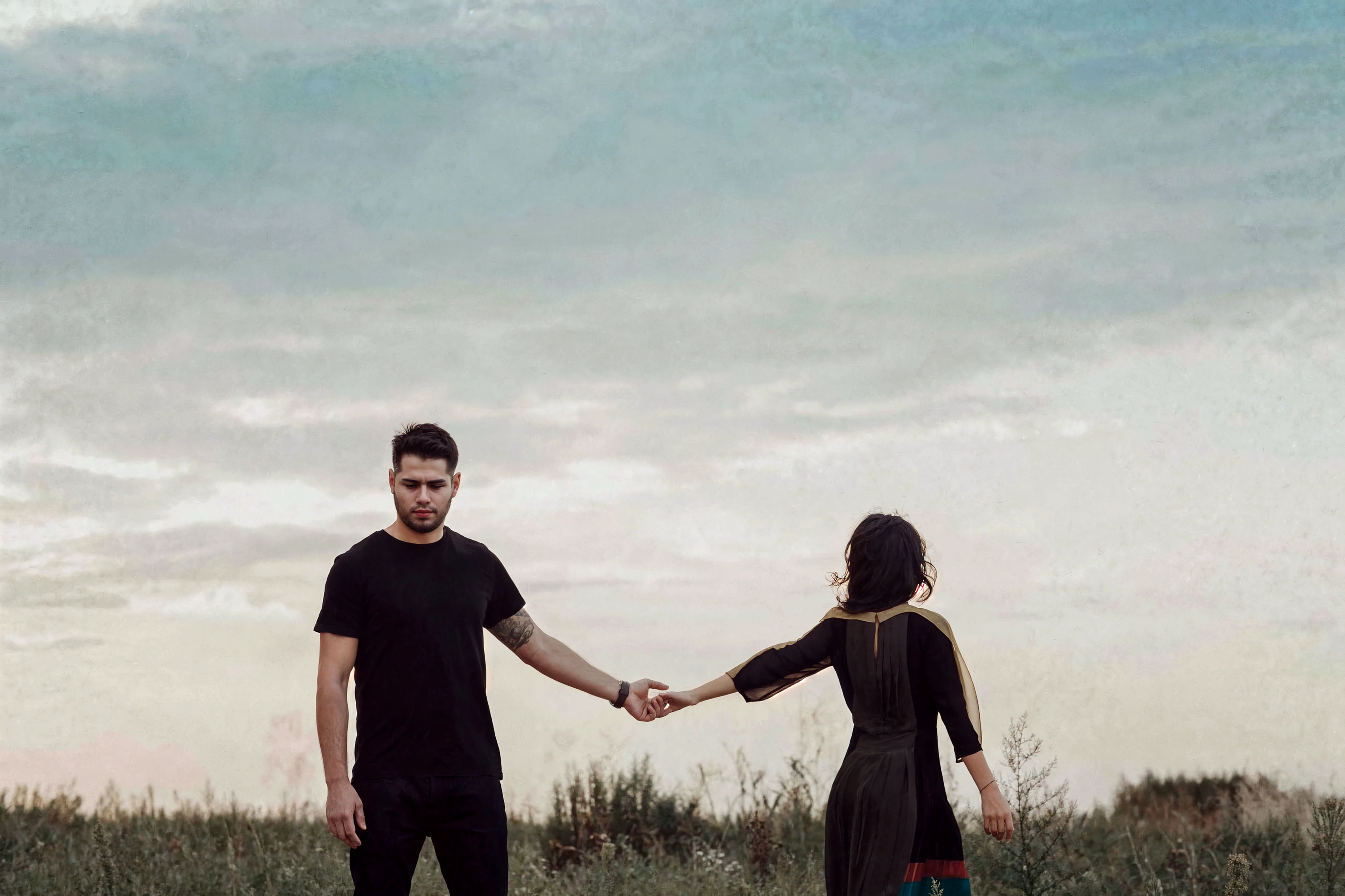 there are two people standing next to a fence kissing, arm around her neck, hugging her knees, they are in love, hugging, beautiful surroundings, private moment, face obscured, candid shot, photoshoot, uhd candid photo of dirty, photo shoot, couple, beautiful scene, hugging his knees, dsrl photo, instagram picture, reylo kissing, picture