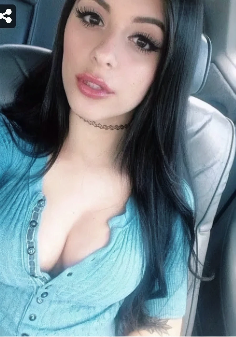 Sexy young woman, large breasts, blue henley shirt, 