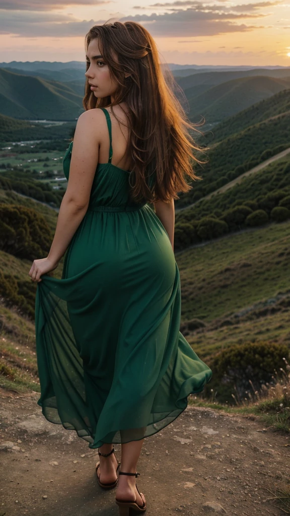 Rear view Very young woman with bright brown disheveled hair, a bit like Scarlett Johansson, curvy figure,  Wonderful big eyes and plump lips, stands on top of a mountain and looks at the landscape. She is dressed in a long chiffon dress, flowing, Flying dark green dress, Sunset