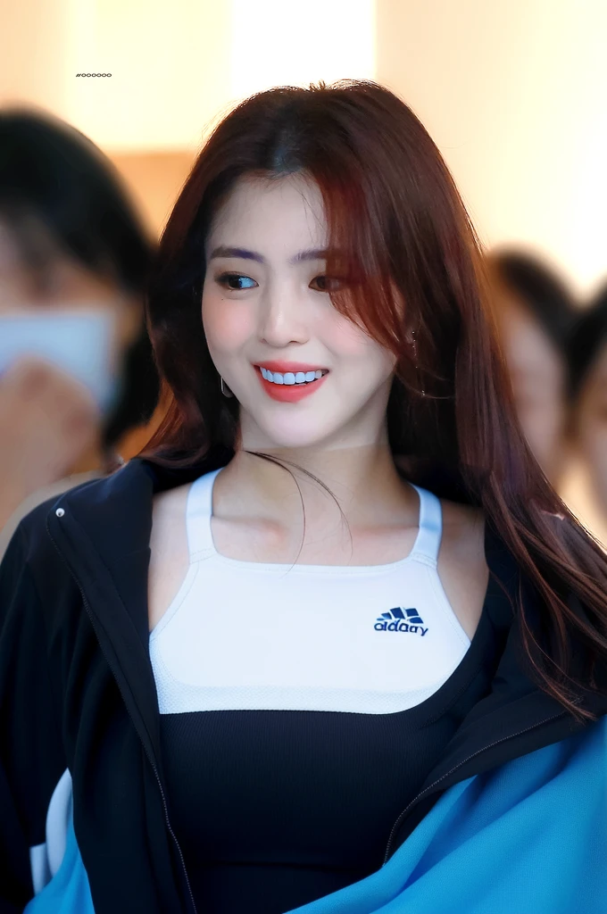 woman wearing white sports bra, lean body, no jacket