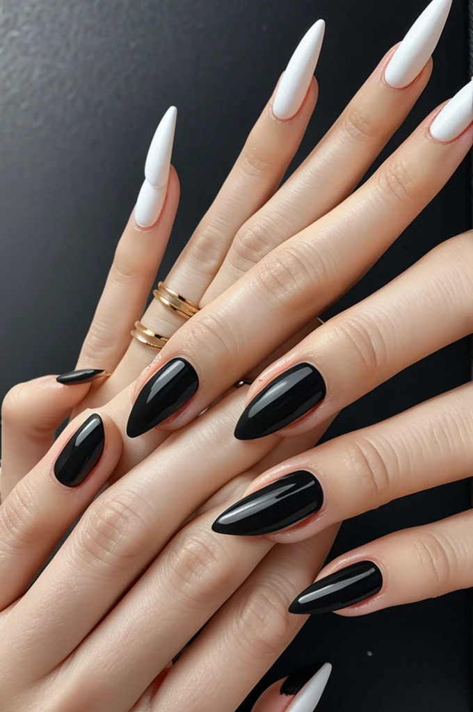 Skinny finger stiletto black nails with the initial A 