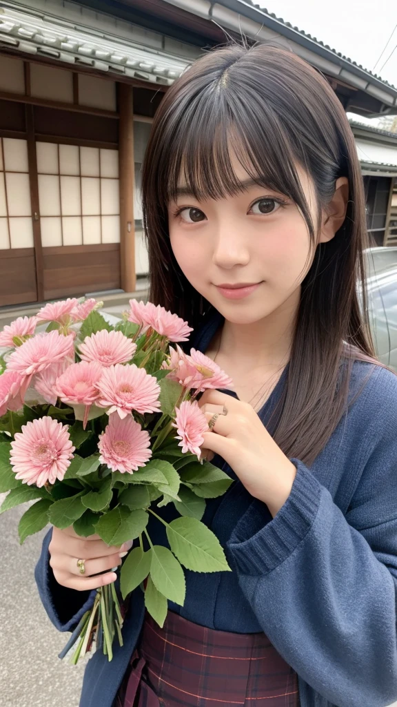 A Japanese girl in her 20s holding a bouquet of flowers