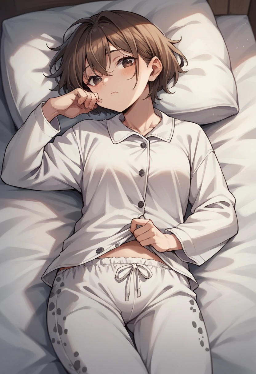   with short brown hair wearing white coly pajamas and gray spots 