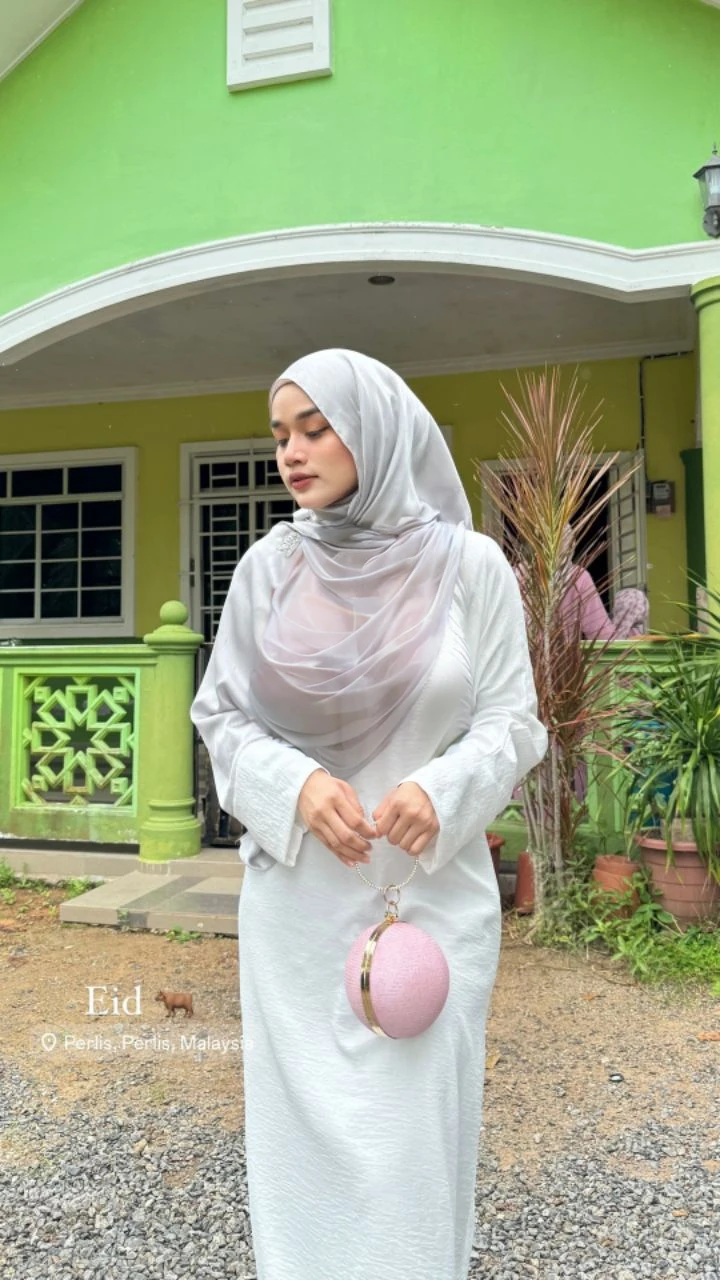 High resolution UHD, Improvement of quality, Soft lighting, Highly detailed, Very detailed on clothes, high quality clothes, Advanced Details, Sharp Focus, High resolution, Big Breasts, Breasts Covered With Hijab and Dress, Real clothes, Real Lighting, Same clothes, Same Clothes With Big Breasts, Big Boob Undershirt covered, A Girl Wearing Niqab