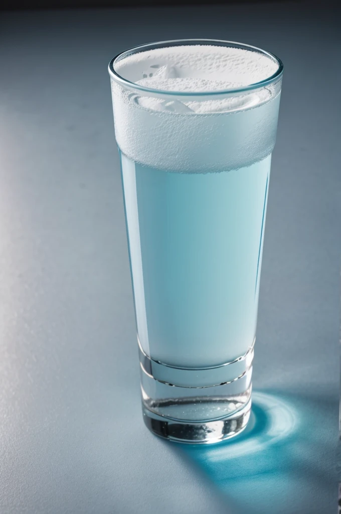 A glass with light blue and white api