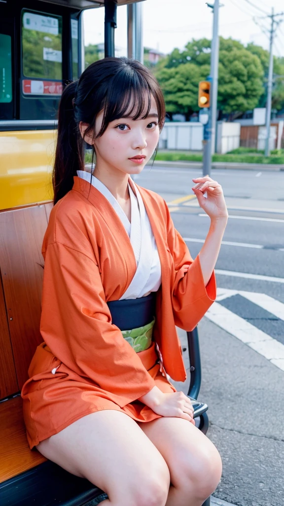 Girl sitting at a bus stop dressed in a kimono