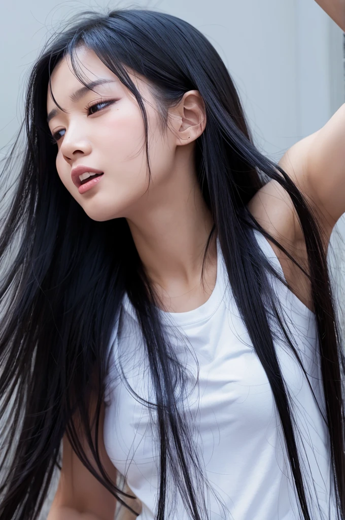 A girl with long black hair climaxing