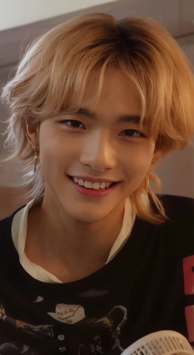 a big eyed asian male with long hair