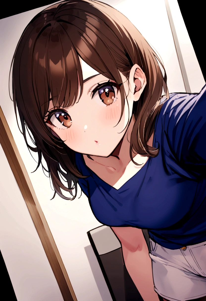 27-year-old brunette with brown eyes taking a selfie wearing a blue blouse and white shorts