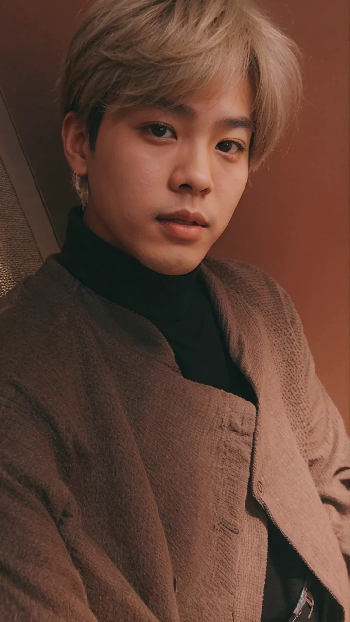 asian boy with a natural and pretty look