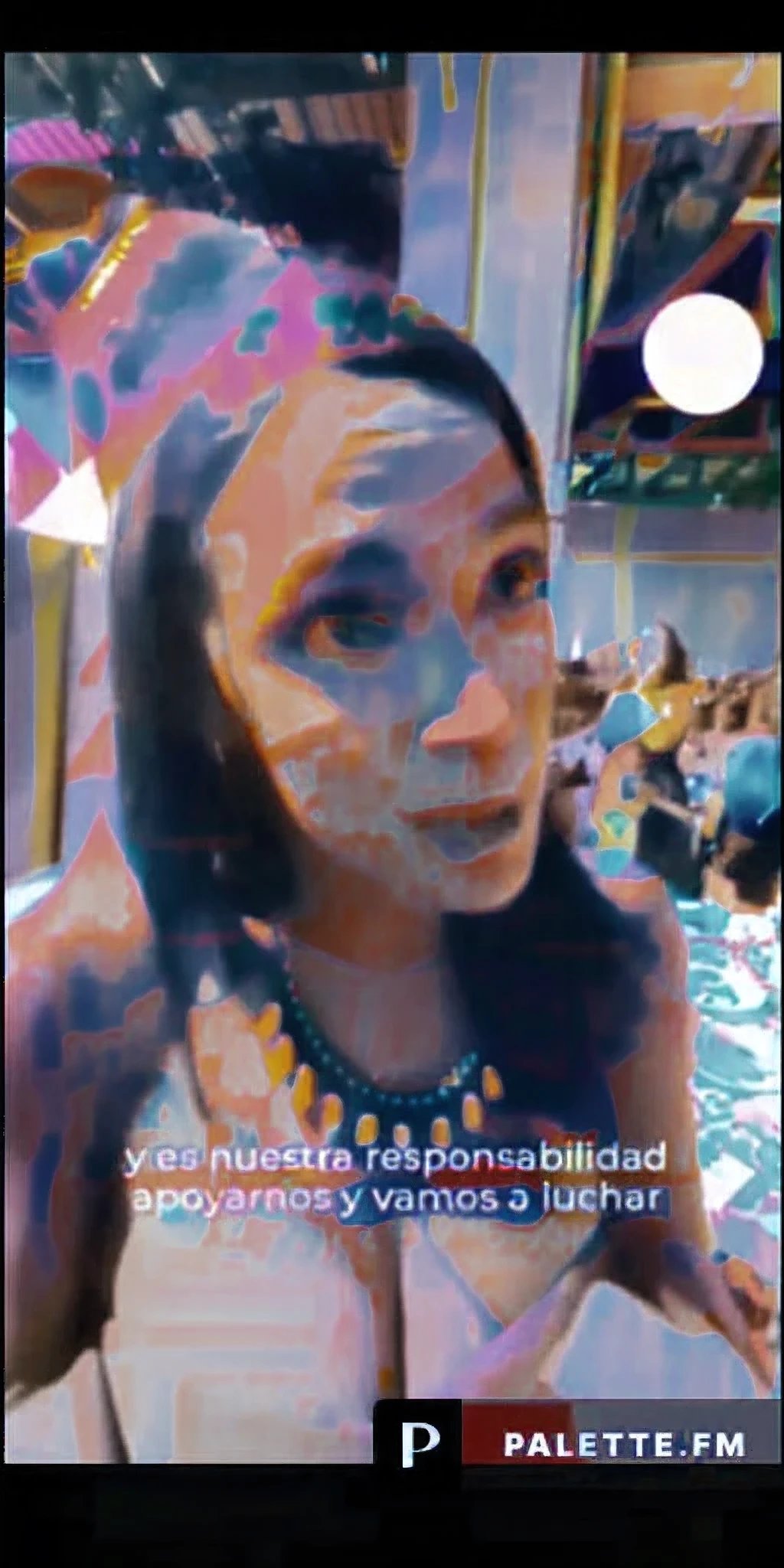 there is a woman with a necklace and a necklace on her neck, dancing in the background, she is facing the camera, snapchat photo, exciting expression, she expressing joy, marvelous expression, profile picture, very excited, live footage, with mouth open