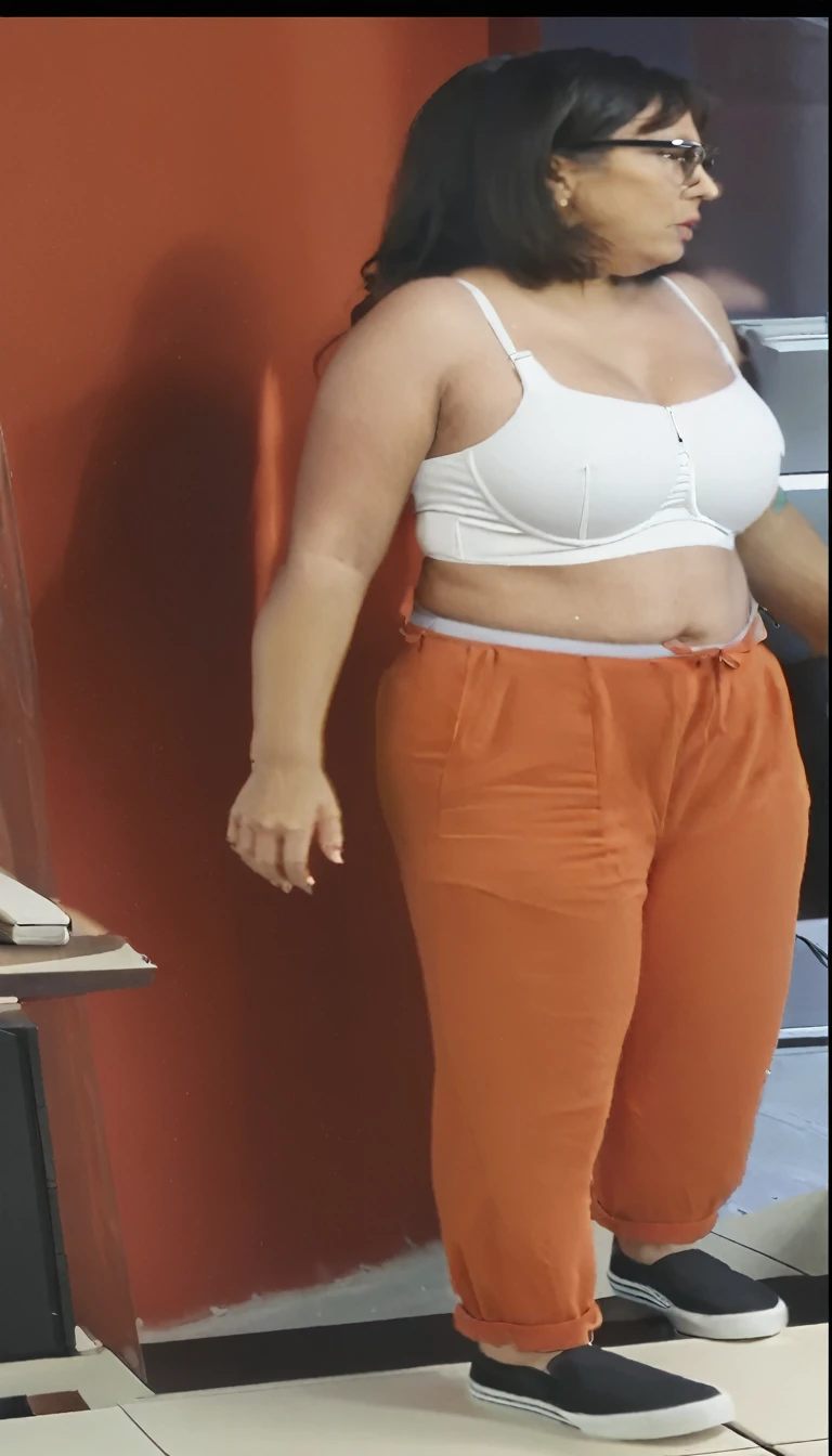 She's shirtless., she's wearing a white bra