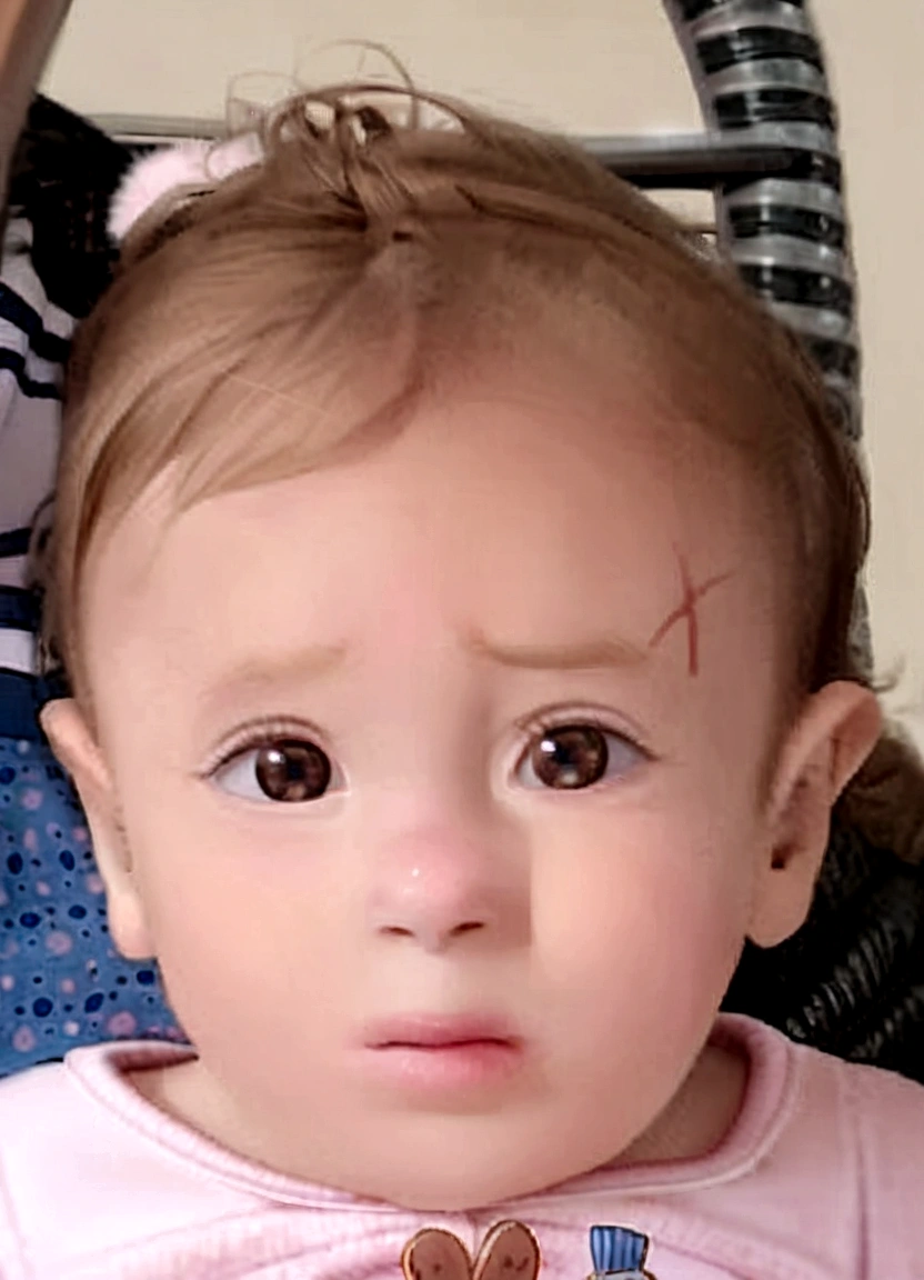 there is a baby that is sitting in a stroller, brown hair and large eyes, beautiful huge-eyed, short brown hair and large eyes, Alexa Grace, huge adorable eyes, marks on your face, she has a cute and expressive face, rosy cheeks, serious expression, with beautiful passionate eyes, large eyes with visible pupils, valentine shuffle, huge-eyed