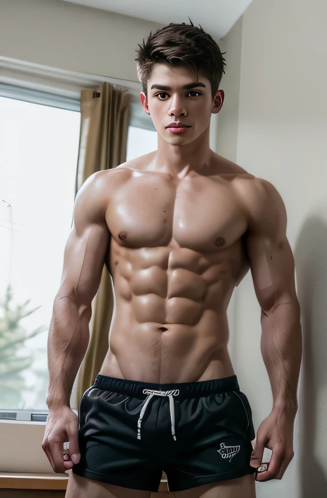 Young Canadian boy with a beautiful body without a shirt and with tight shorts showing his penis