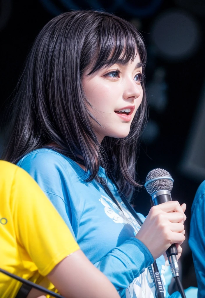 Black haired woman wearing a blue shirt Holding a mic