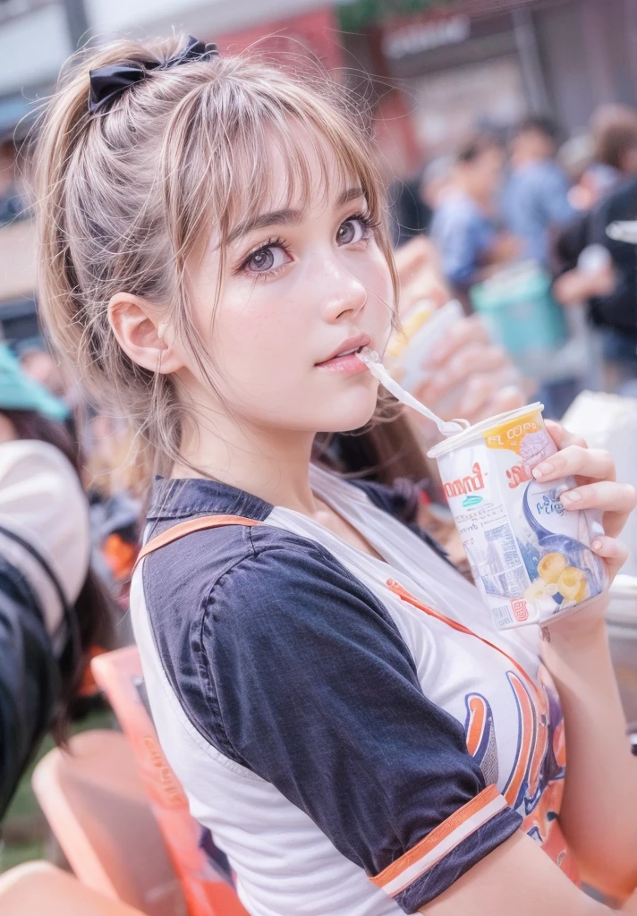 Beautiful brown-haired woman is drinking a box of milk