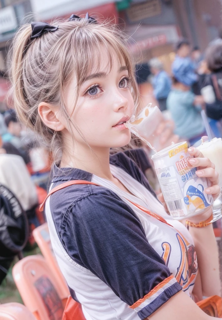 Beautiful brown-haired woman is drinking a box of milk