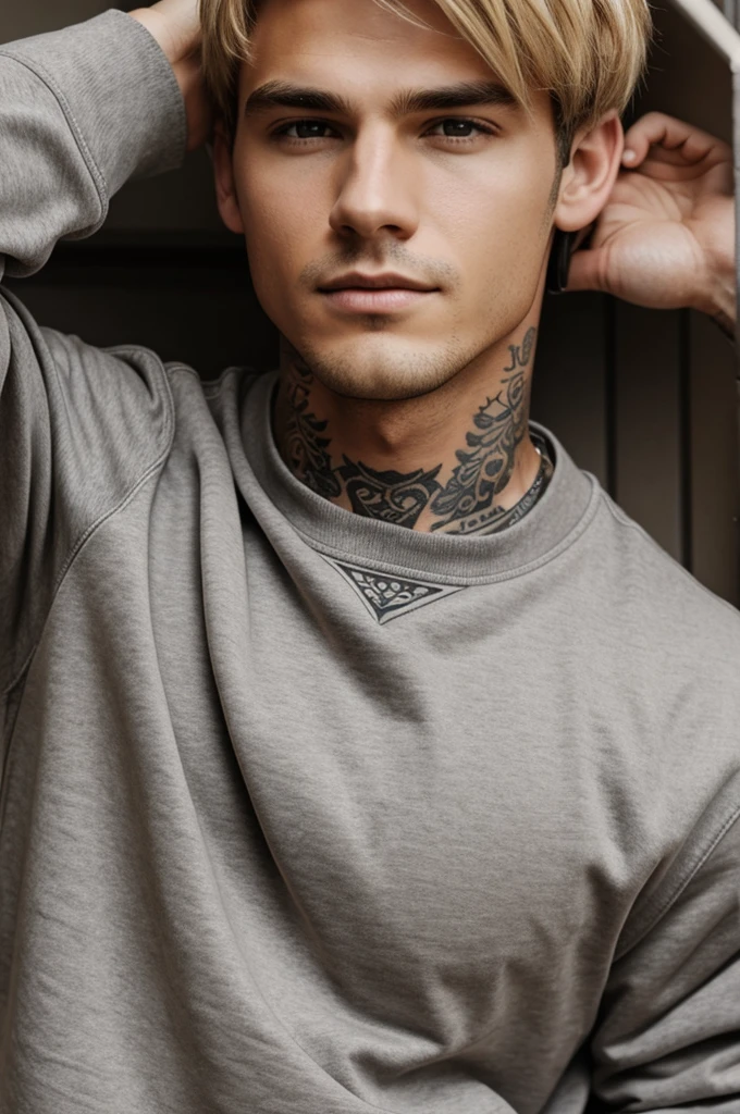 boy, blond, Brown eyes, gray sweatshirt, tattoo on the neck