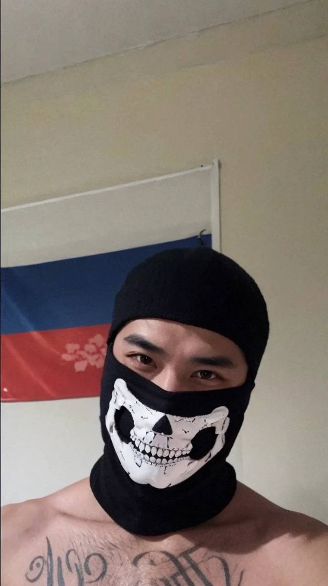 An Asian man with mask