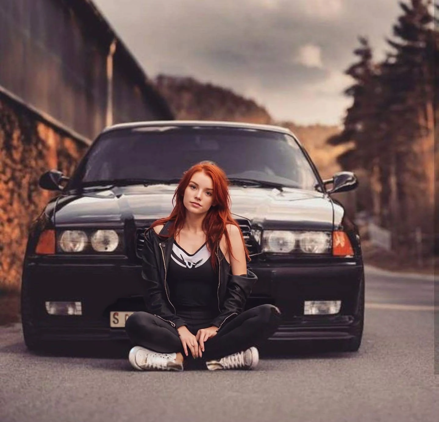 , 25-year-old girl with shoulder-length messy red hair, black jacket, black leggins,