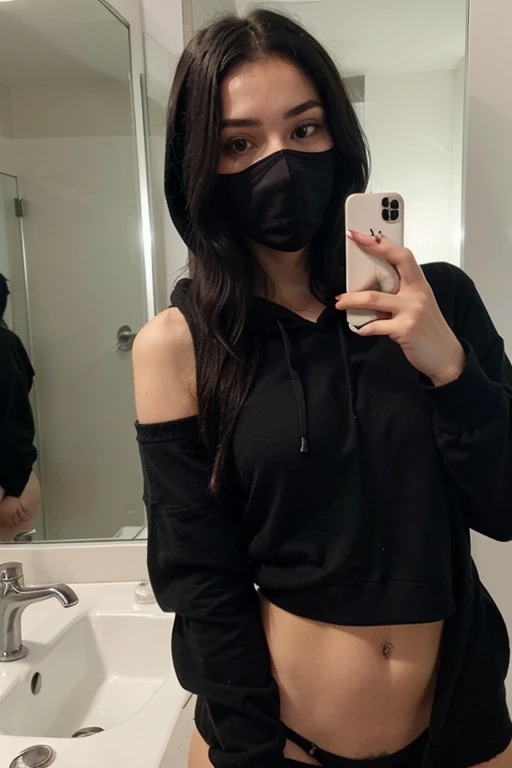 Sexy girl with long black hair wearing black hooded mask wearing a black sweater taking a selfie in the mirror looking sideways